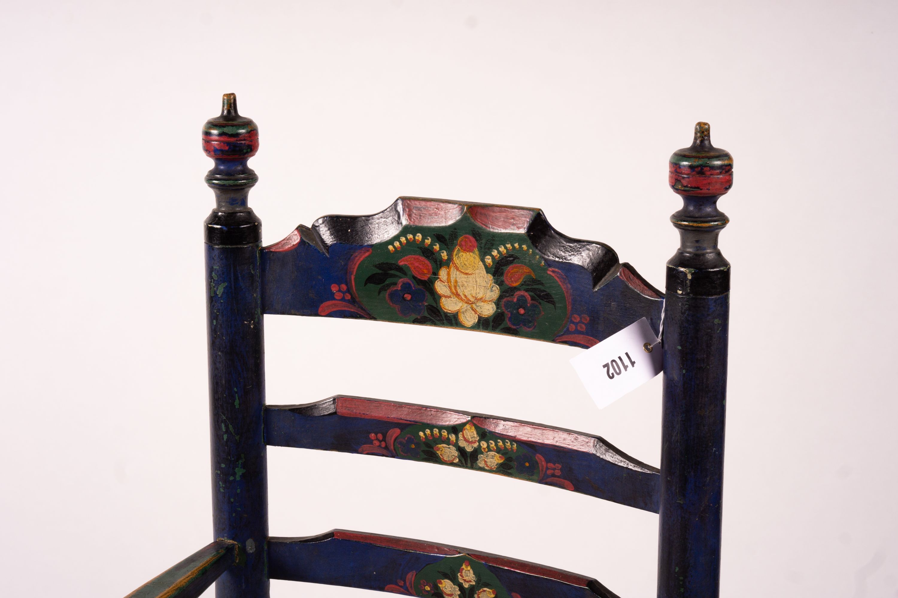 Two 19th / early 20th century Swiss painted rush seat chairs, together with a square low table